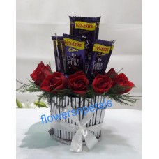 10 red Roses & 5 Dairy Milk Chocolate in a Round basket